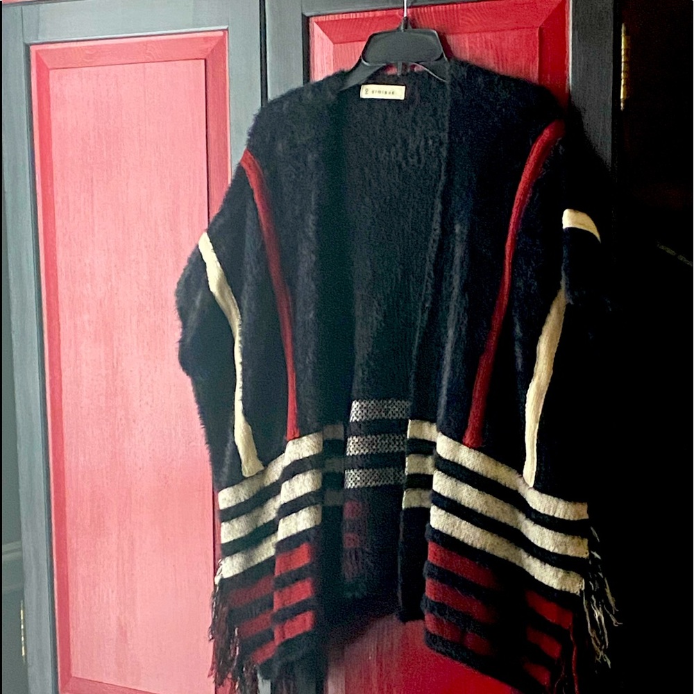 Beautiful cardigan throw that’s light and easy to layer